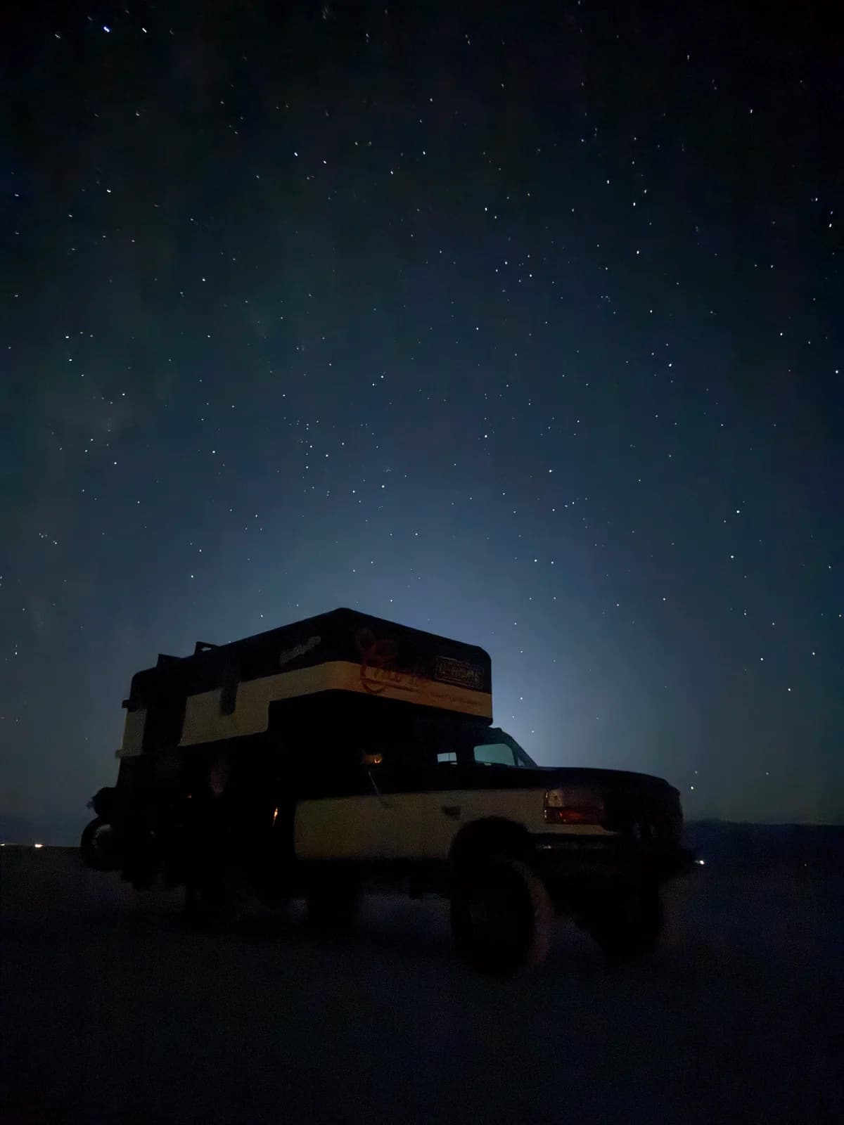 Charlie parked under a dark night sky
