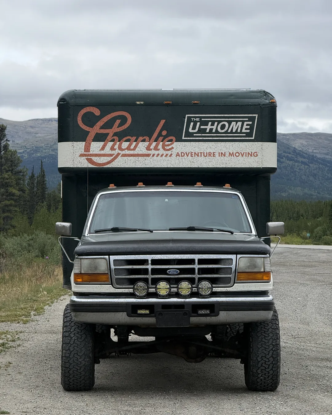 Charlie, Matt’s finished white and dark-green truck-house